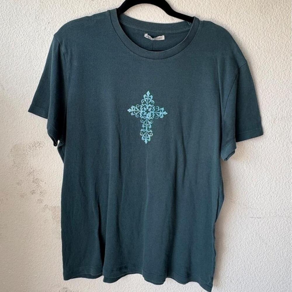 Green womens tee featuring cross